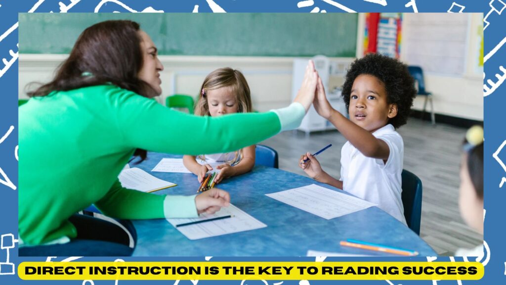 A teacher giving a high-five to a successful student while another student watches and learns in a direct instruction lesson.